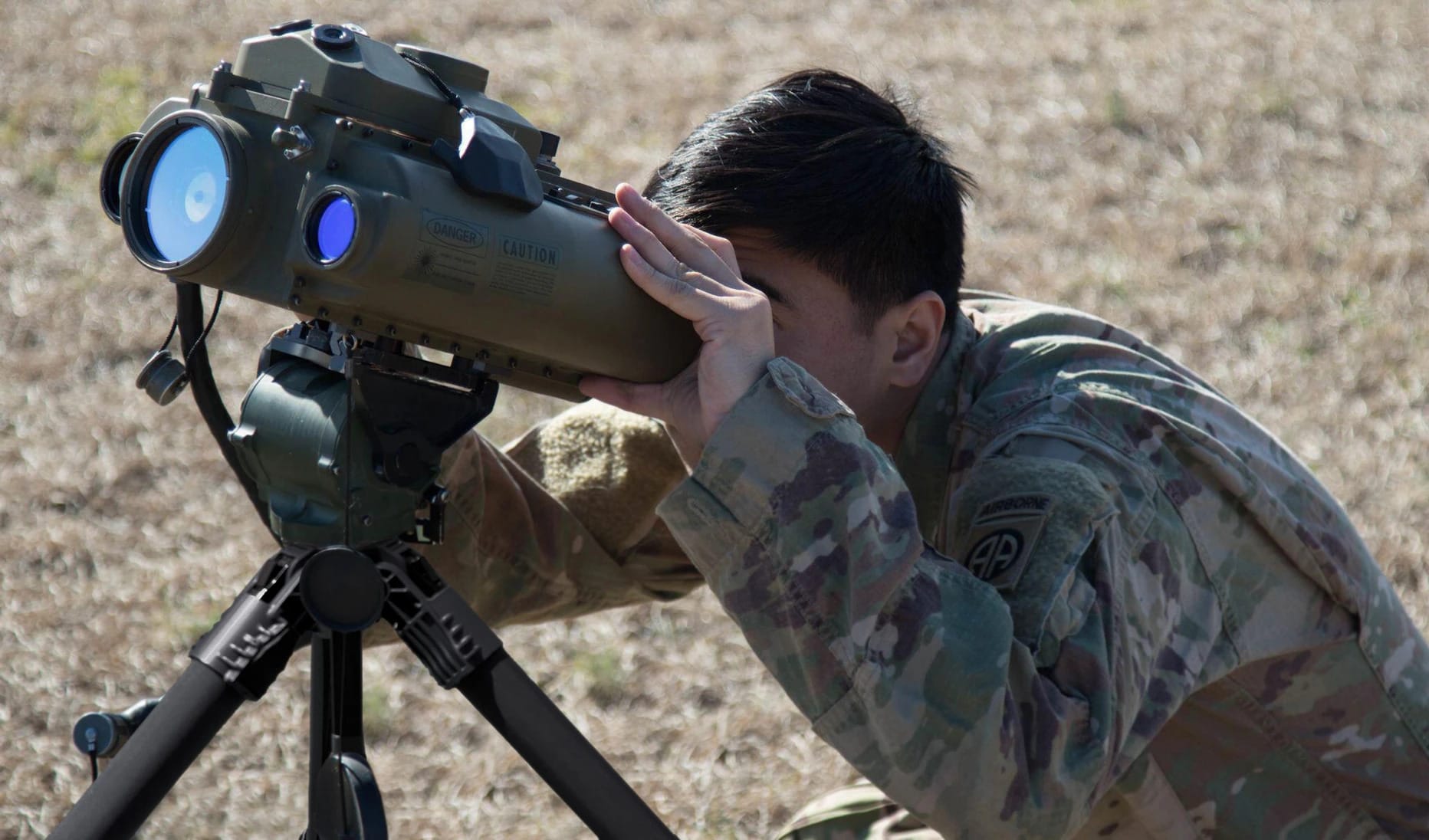Photo of a soldier using a scope device on top of a Rolatube tripod