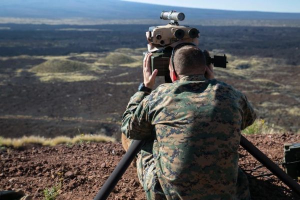 A photo of a soldier using a Rolatube tripod
