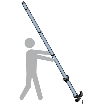 Person carefully lifting the IAM/insert/mount structure to vertical position