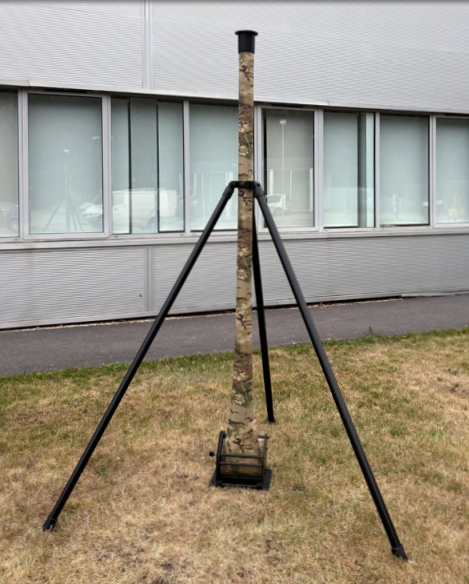 Mast Support System deployed with single tube mast outside building