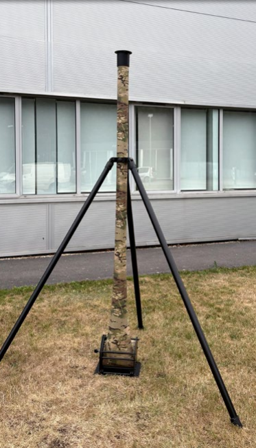 Mast Support System deployed outside Rolatube building &mdash; full view