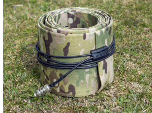 Rolled IAM in compact stowed state with cable wrapped