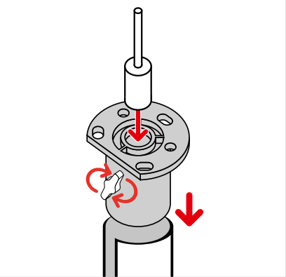 Top load being inserted into top cap and secured with wing screw