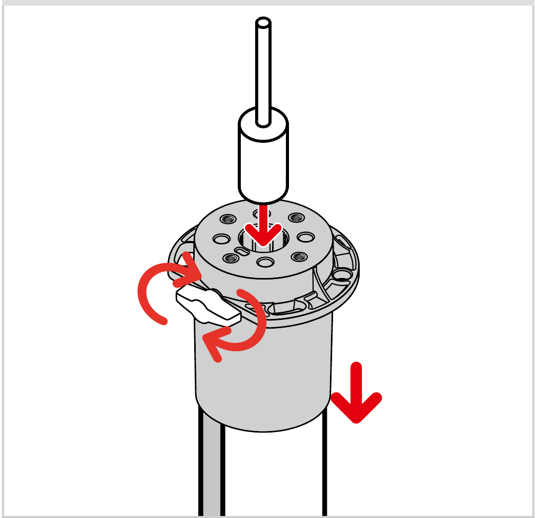Top load being inserted into the top cap and secured with the wing screw